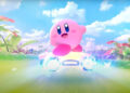 A screenshot from the Kirby Air Riders reveal trailer, showing Kirby waving to the camera.