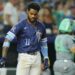 Aug 15, 2025; Kansas City, Missouri, USA; Kansas City Royals third baseman Maikel Garcia (11) throws his helmet after striking out to end the eighth inning against the Chicago White Sox at Kauffman Stadium. Mandatory Credit: Jay Biggerstaff-Imagn Images