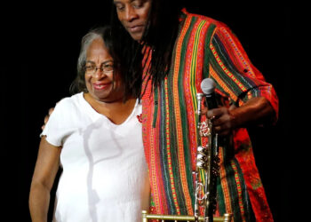 Hannibal Lokumbe embraces Marilyn Luper Hildreth during a 2022 jazz concert as part of the Freedom Fiesta celebration at the Yale Theater in Oklahoma City. Hildreth is the daughter of educator and civil rights leader Clara Luper.