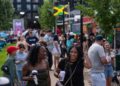 Smiling people enjoying On The One Music Festival