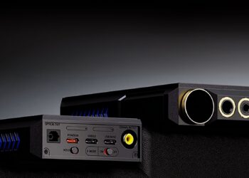 Two views showing the connections on the top and bottom of the FiiO M27 portable player. They're shot on a dark surface against a dark grey background