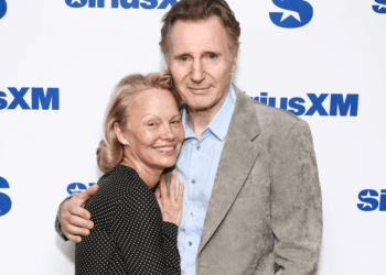 Pamela Anderson & Liam Neeson Play Along With Dating Rumors in New Video