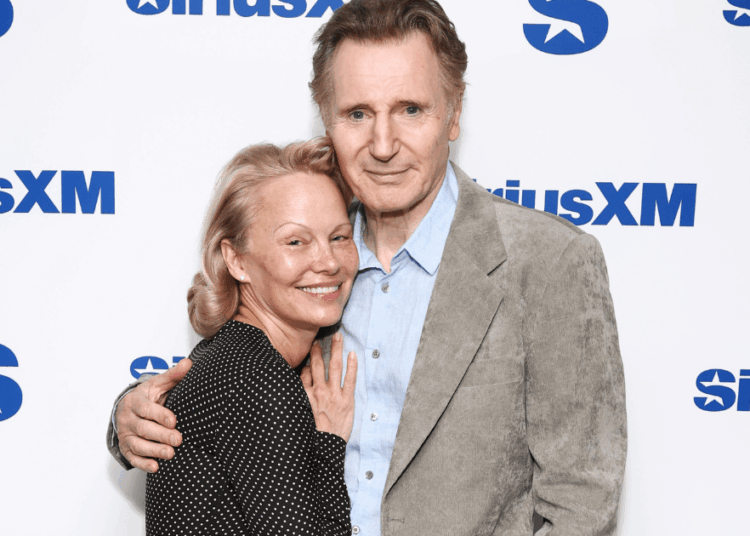 Pamela Anderson & Liam Neeson Play Along With Dating Rumors in New Video