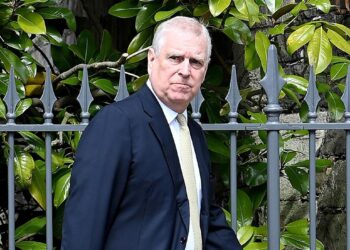 Prince Andrew walks outside Windsor Castle on Easter 2025