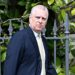 Prince Andrew walks outside Windsor Castle on Easter 2025