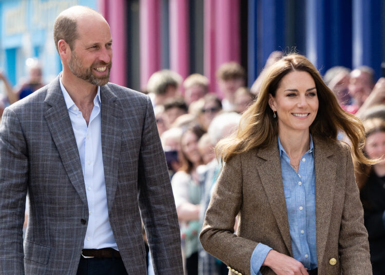 TOBERMORY, SCOTLAND - APRIL 29: Prince William, Prince of Wales, known as the Duke of Rothesay when in Scotland and Catherine, Princess of Wales, known as the Duchess of Rothesay when in Scotland arrive for a visit to a local market on April 29, 2025 in Tobermory, Scotland. The Prince and Princess of Wales are on a two-day visit to the Isles of Mull and Iona on the 29th and 30th of April to engage with rural island communities. During their time on the islands, they will connect with local residents, highlighting the value of social bonds and underscoring the importance of safeguarding and advocating for the natural environment. (Photo by Samir Hussein/WireImage)