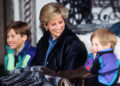 LECH, AUSTRIA - MARCH 30: Princess Diana With Prince William And Prince Henry (harry) In Lech, Austria. They Are Sitting In A Carriage With A Blanket Covering Them. Sitting Behind Is Their Nanny Olga Powell. (Photo by Tim Graham Photo Library via Getty Images)