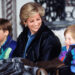 LECH, AUSTRIA - MARCH 30: Princess Diana With Prince William And Prince Henry (harry) In Lech, Austria. They Are Sitting In A Carriage With A Blanket Covering Them. Sitting Behind Is Their Nanny Olga Powell. (Photo by Tim Graham Photo Library via Getty Images)
