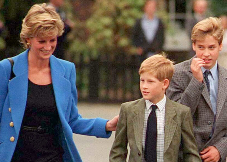 Prince William with Diana, Princess of Wales and Prince Harry on the day he joined Eton in September 1995. (Photo by Anwar Hussein/WireImage)