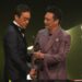 Francis Ng (right) presents Lau Ching-wan with the best actor statue at the 41st Hong Kong Film Awards ceremony in April 2023. Photo: SCMP