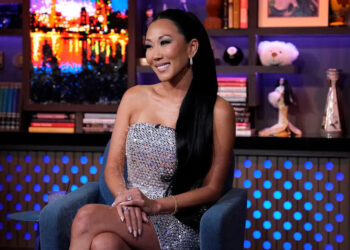 Katie Ginella in a silver dress on Watch What Happens Live