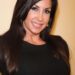 Jacqueline Laurita posing for a picture.