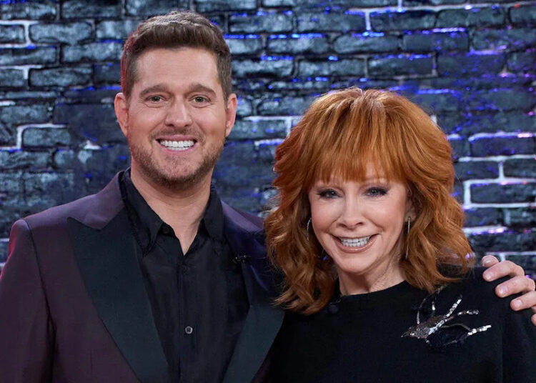 Michael Bublé and Reba McEntire smile together on The Voice Episode 2609.
