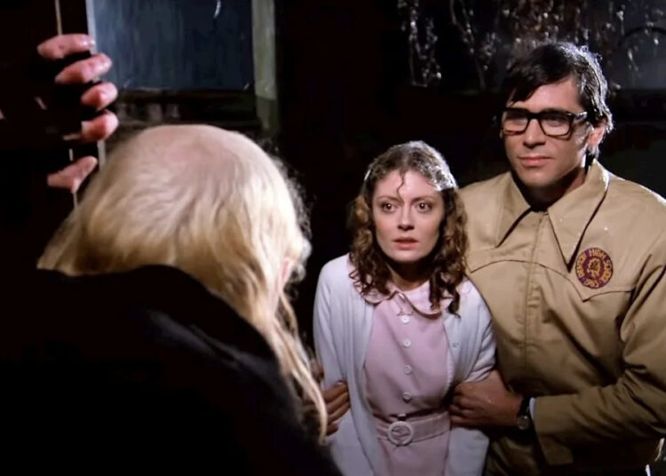 Brad (Barry Bostwick) and Janet (Susan Sarandon) arrive at the mansion in the film "Rocky Horror Picture Show."