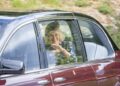 King Charles III and Queen Camilla  leave after attending a service at Crathie Kirk, near Balmoral.