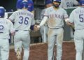 Royals squander early lead, give one away to Rangers