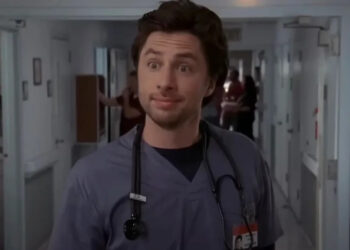 Zach Braff's JD uncomfortably smirking in Scrubs.