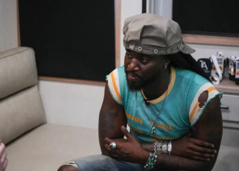 Country artist Shaboozey sits down for an interview with The Enquirer during the Voices of America Country Festival at the VOA Park in West Chester on Aug. 8.