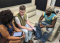 Shaboozey chats with The Enquirer's Haadiza Ogwude, left, and David Wysong at the VOA Country Music Fest.