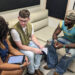 Shaboozey chats with The Enquirer's Haadiza Ogwude, left, and David Wysong at the VOA Country Music Fest.
