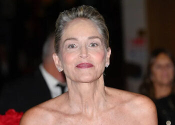 Actress Sharon Stone wears red strapless dress in Italy