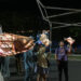 Passers-by look at illuminated sculptures by Kristian Brevik along Pine Street in Burlington on Sept. 6, 2024 during the South End Art Hop.
