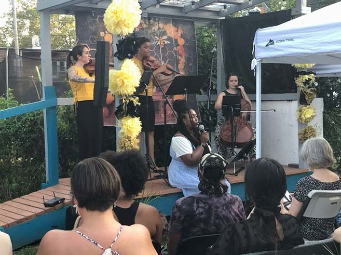 Renovare members Rebecca Shasberger, right, on cello, Clara Prinston, rear center on viola, vocalist LaToya Kent, sitting, and Lalia Mangione, left, on violin.