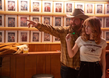 Lefty (Paul Walter Hauser, left) and Penny Jo (Sydney Sweeney) fall in love in "Americana."