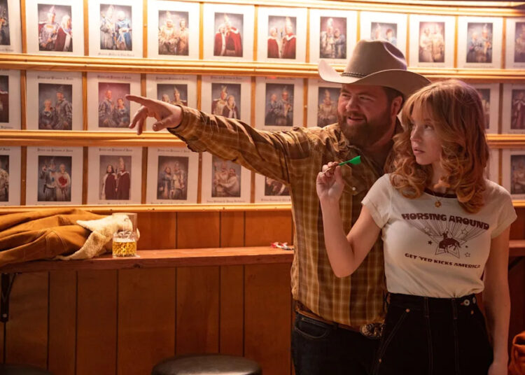 Lefty (Paul Walter Hauser, left) and Penny Jo (Sydney Sweeney) fall in love in "Americana."
