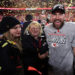 KANSAS CITY, MISSOURI - JANUARY 26: Travis Kelce #87 of the Kansas City Chiefs celebrates with Taylor Swift and mother Donna Kelce after the Chiefs defeated the Buffalo Bills 32-29 to win the AFC Championship Game at GEHA Field at Arrowhead Stadium on January 26, 2025 in Kansas City, Missouri. 
