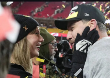 Travis Kelce and Taylor Swift stand on the field after the Chiefs defeated the Buffalo Bills 32-29 in the AFC Championship Game in January. File Photo by Jon Robichaud/UPI.