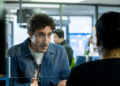 Malik Elassal as Samir, talking to a bank teller, in 'Adults.'