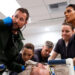 Noah Wyle, far left, and Supriya Ganesh, far right.