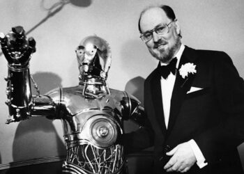 Williams with Star Wars droid C3P0 in 1980