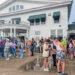 Despite the wet weather, a strong showing of local extras dressed in 1990s attire showed up for "The Ultimate '90s Movie" (working title) on Aug. 9 at Bay Beach Amusement Park in Green Bay. The rescheduled date of Aug. 18 was also rained out. Extras are invited to return at 11:30 a.m. Aug. 19.