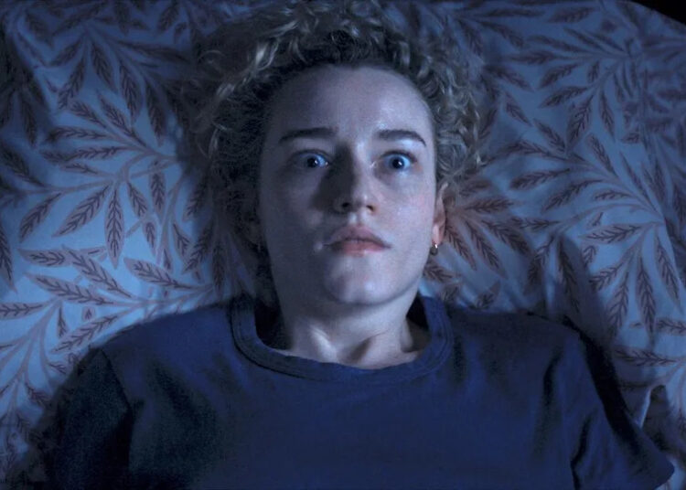 Julia Garner waking up for a nightmare in Weapons.