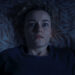Julia Garner as Justine in bed in Weapons.