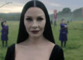 Morticia outside during the day in Wednesday Season 2.