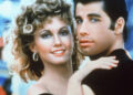 John Travolta and Olivia Newton-John embrace in a promotional still for the film "Grease."