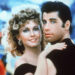 John Travolta and Olivia Newton-John embrace in a promotional still for the film "Grease."
