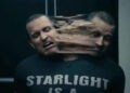 A person in a "Starlight is a..." shirt with a distorted face, suggesting a special effect or action scene
