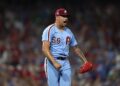 Sep 11, 2025; Philadelphia, Pennsylvania, USA; Philadelphia Phillies pitcher Jhoan Duran (59) reacts after a strike out to end the game with a win against the New York Mets at Citizens Bank Park. Mandatory Credit: Bill Streicher-Imagn Images