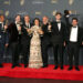 Vincent Kardasik (from left), Ryan Heller, Michael Bloom, Garrett McNamara, Zachary Rothfeld, Joe Lewis and Chris Smith celebrate winning an Emmy for outstanding documentary or nonfiction series for "100 Foot Wave" at the 2025 Creative Arts Emmy Awards in Los Angeles Sept. 7, 2025. Smith, a University of Wisconsin-Milwaukee alum, also shared an Emmy for outstanding cinematography, also for "100 Foot Wave."