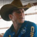 Travis at a horse show on yellowstone season 4.
