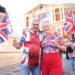 Attendees waved Union flags enthusiastically during the show, against a backdrop of protesters carrying the flag in London