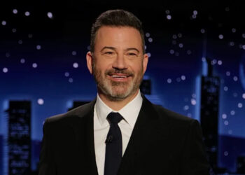 Jimmy Kimmel smiling during monologue on Jimmy Kimmel Live.
