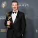 Jimmy Kimmel poses in the press room with the award for host for a game show for "Who Wants to Be a Millionaire" during night two of the Creative Arts Emmy Awards at the Peacock Theater in Los Angeles. (Photo by Richard Shotwell/Invision/AP)