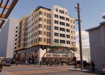 An architect's rendering shows an eight-story apartment building rising behind the facade of Amoeba Music in Berkeley