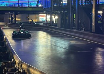 A guest prepares to turn on one of two go-kart tracks at Andretti Indoor Karting & Games in Fort Worth. (Cody Thorn/Community Impact)