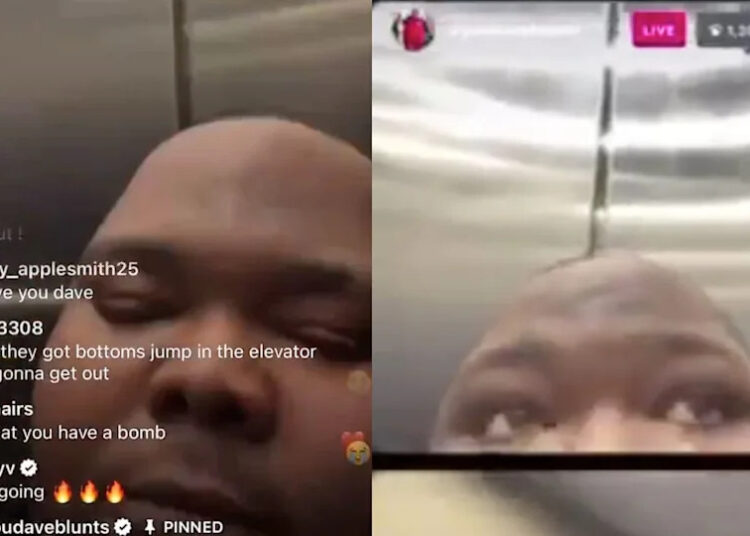 A person in an elevator during a live stream, with comments visible on the screen.